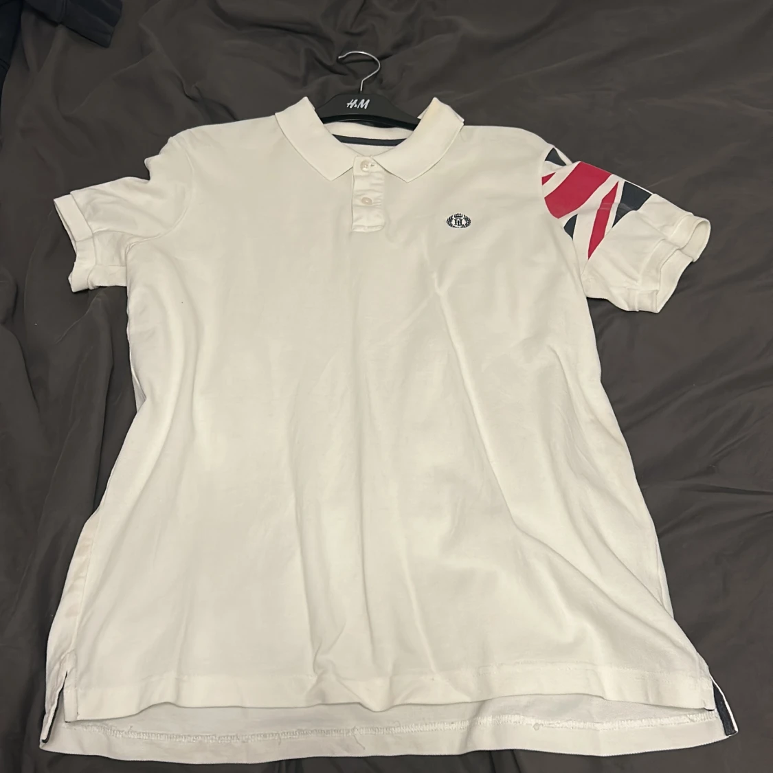 Vit piké från Henri Lloyd med tryck