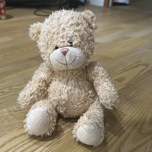 Gosedjur - Ett beige gulligt gosedjur