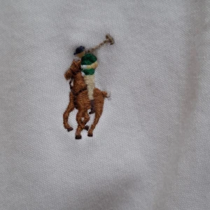 Polo ralph louren pikué - En polo ralph louren pikué i mycjrt fint skick med sgorlek large.