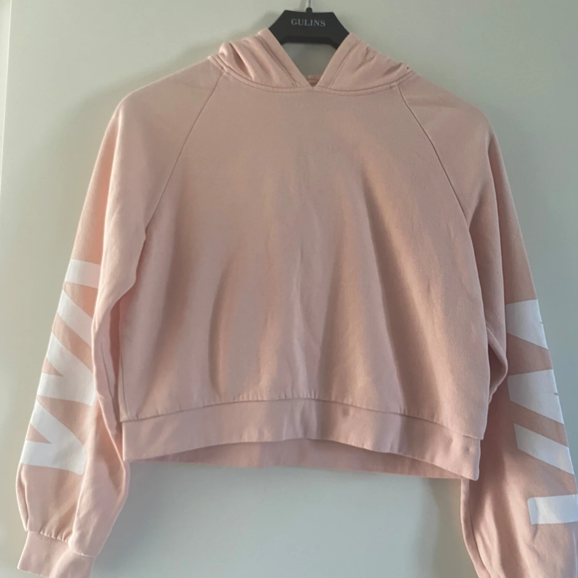 Ljusrosa hoodie från Warp