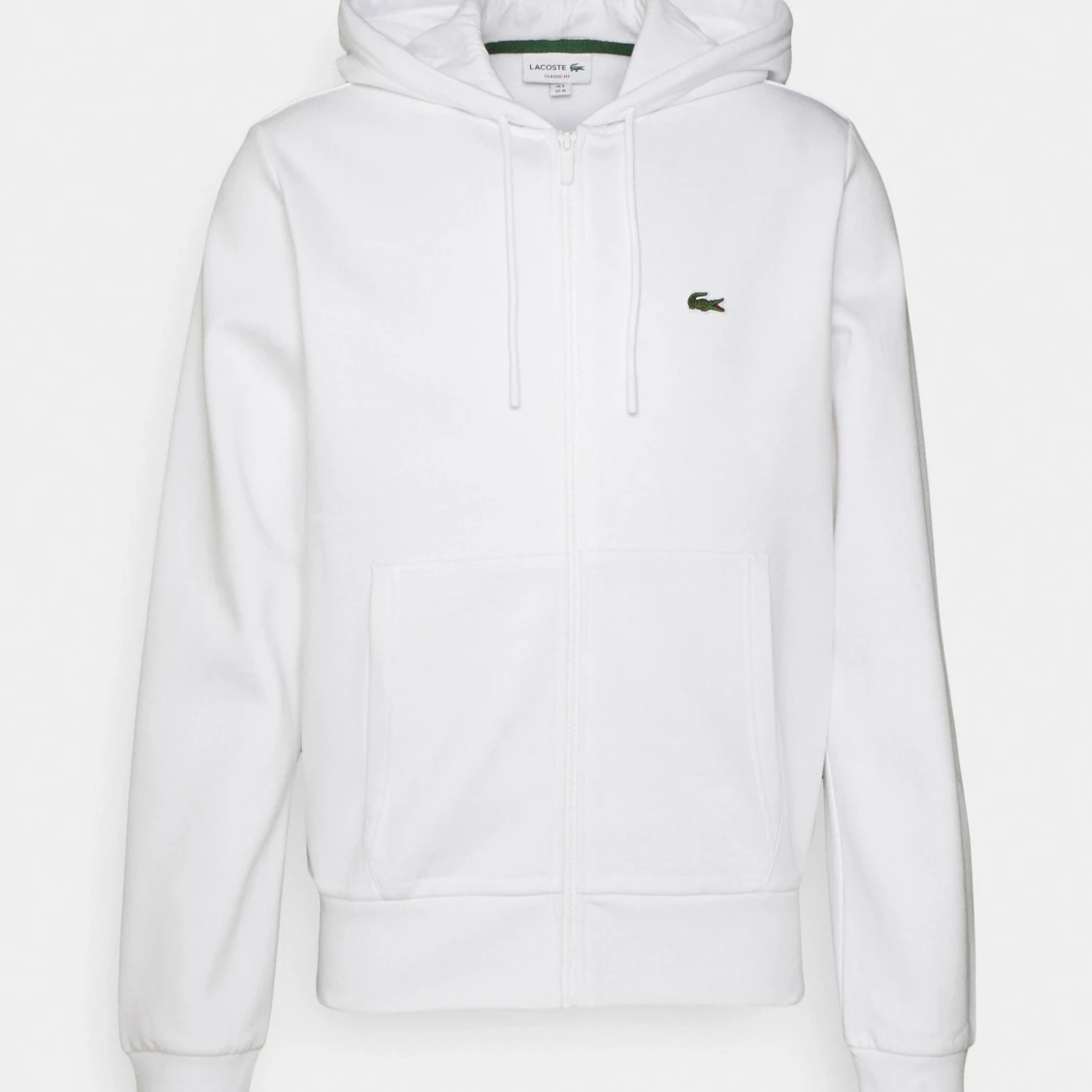 Vit hoodie från Lacoste med dragkedja