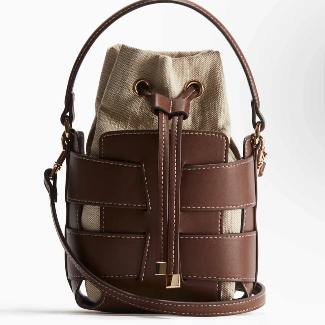 Brun bucket bag med canvasdetaljer