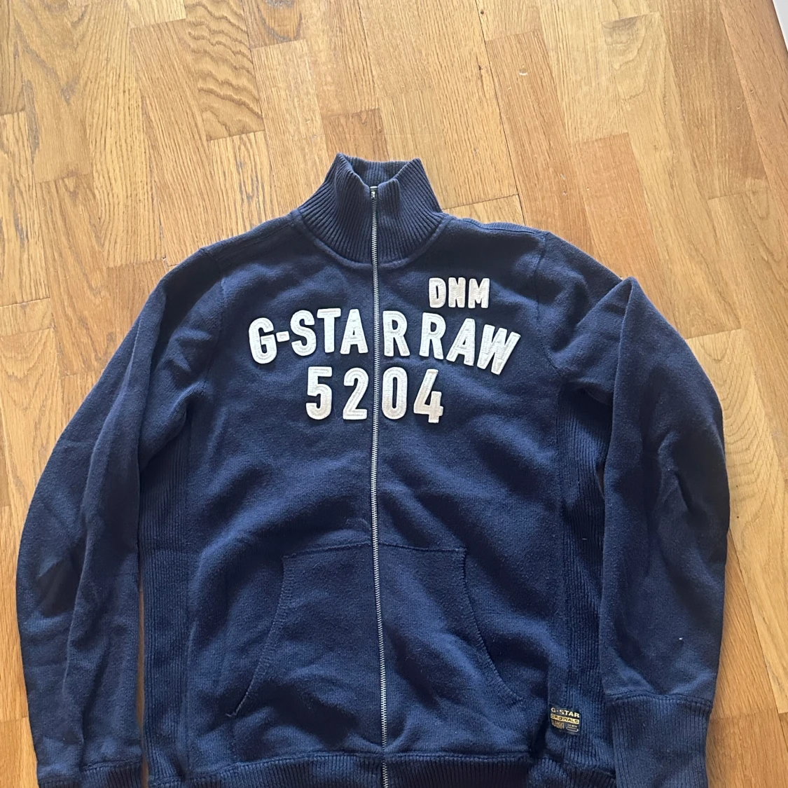 Mörkblå tröja med dragkedja från G-Star RAW