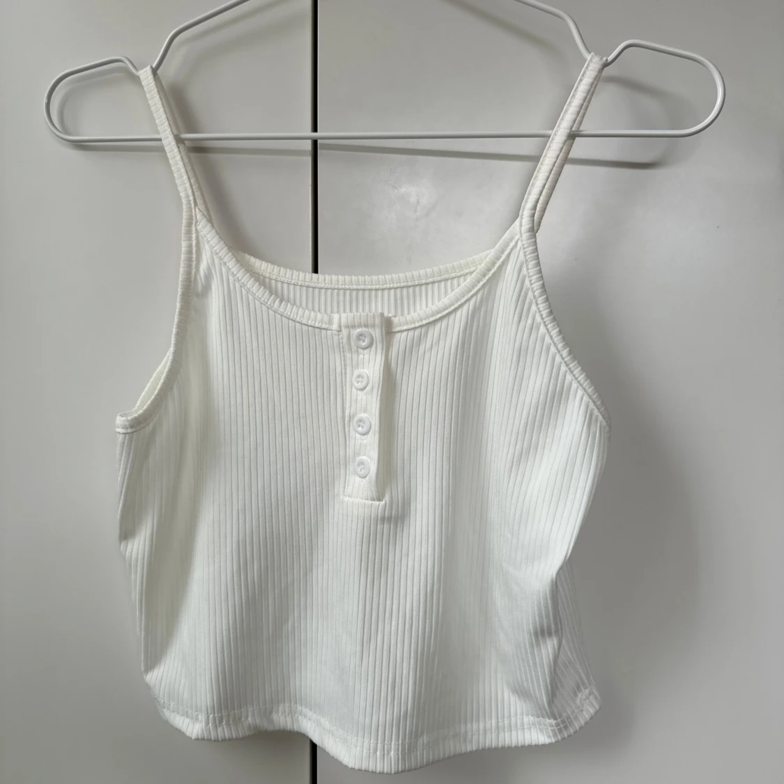 Vit ribbad linnetopp