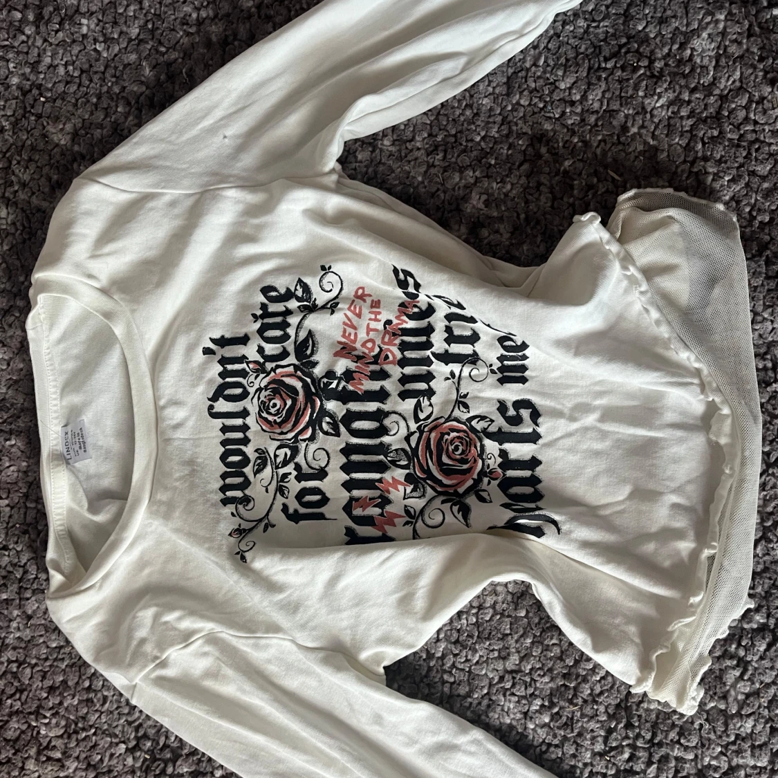 Vit långärmad topp med tryck och volang - 1