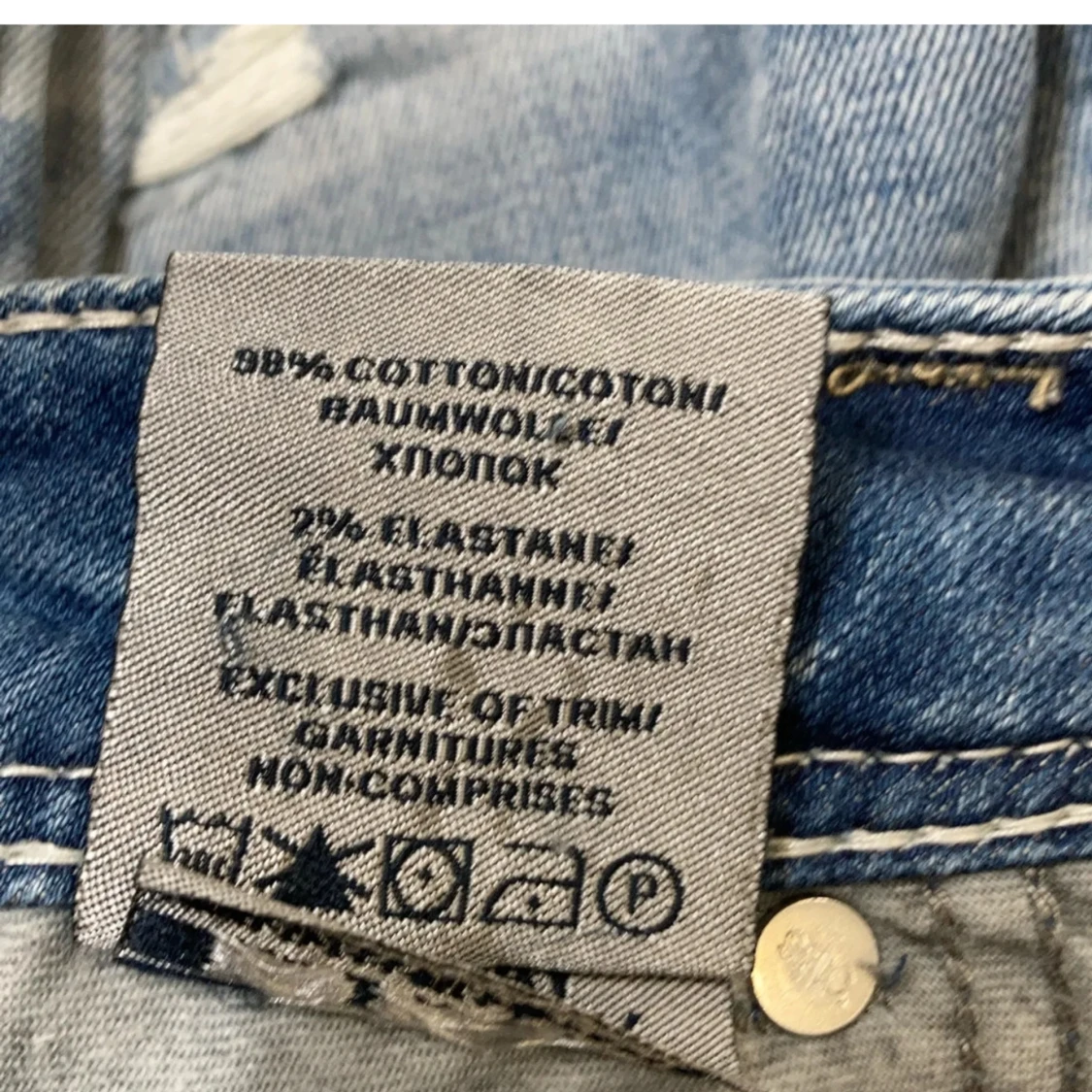 Ljusblå slitna bootcut jeans från Silver Jeans Co. - 3