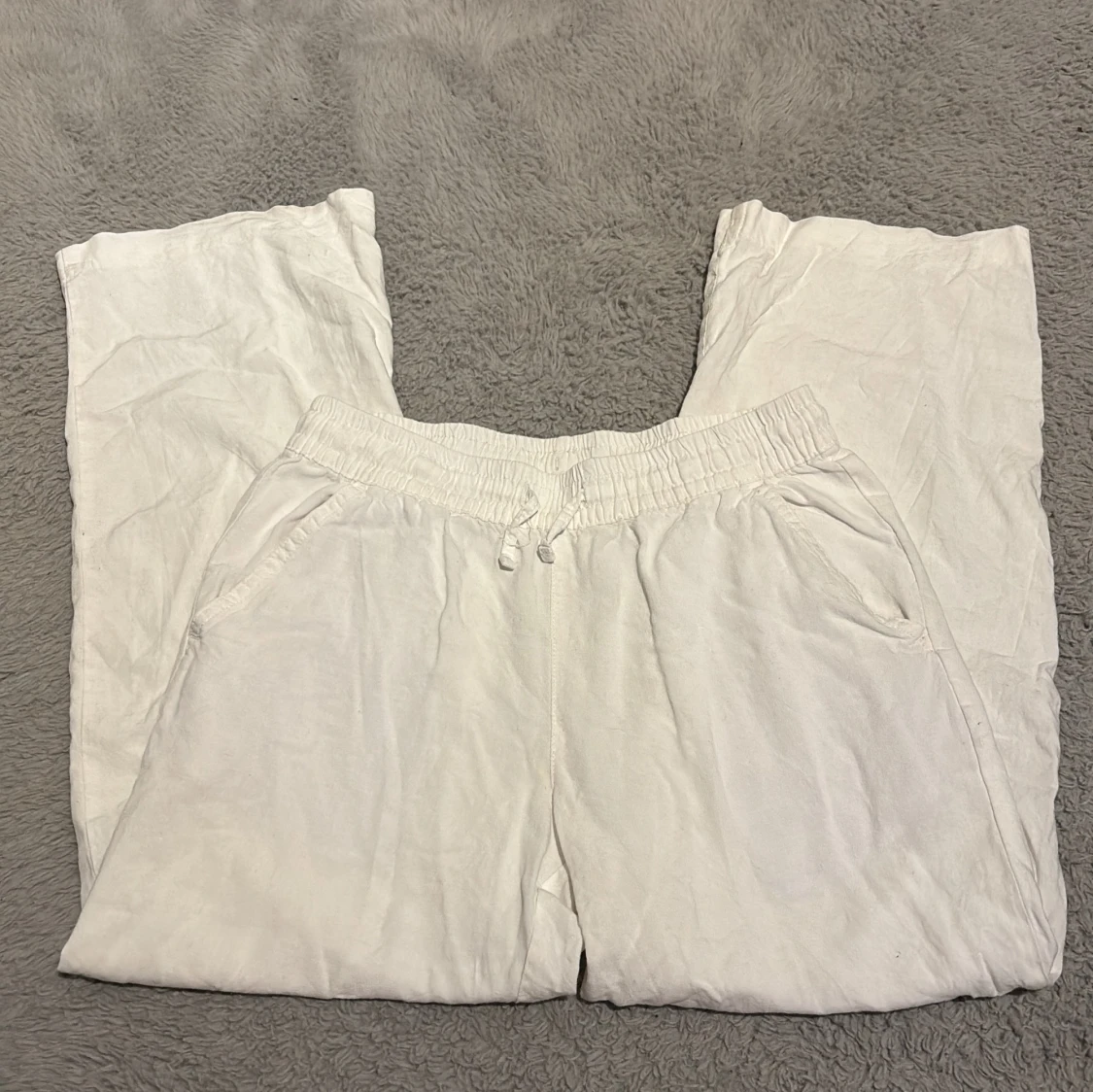 Vita linnebyxor storlek 150