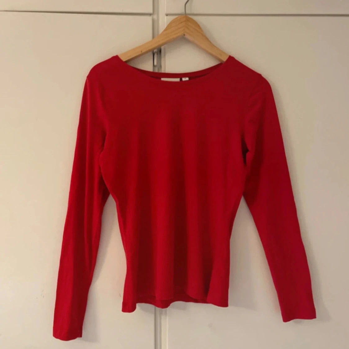 Röd långärmad tröja från Kappahl