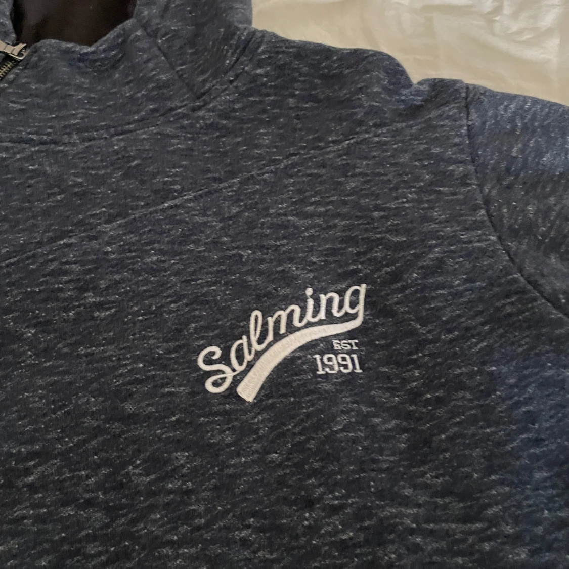 Mörkblå hoodie från Salming - 1