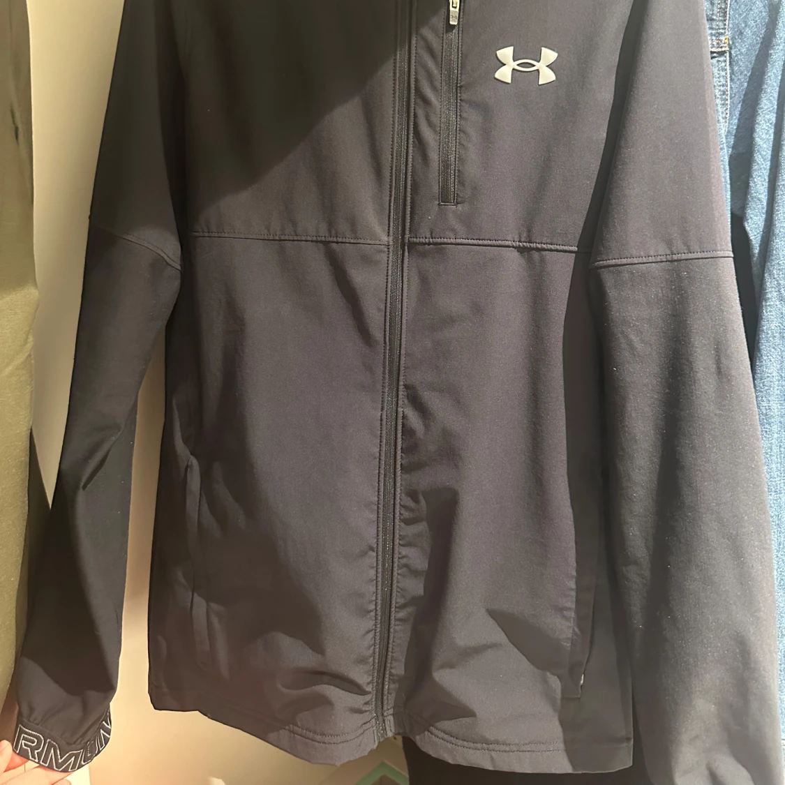 Svart vindjacka från Under Armour