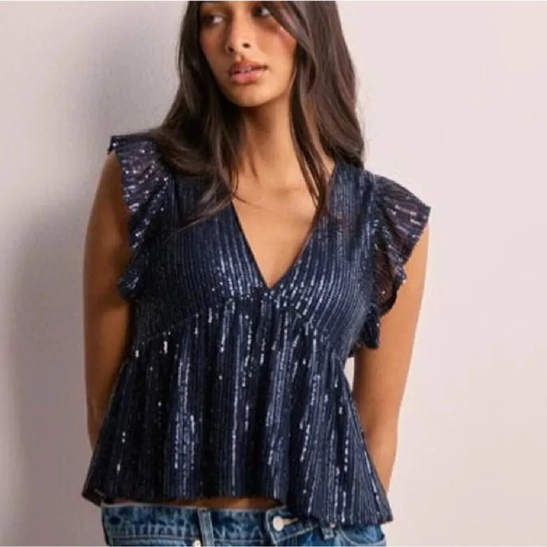 Glittrig mörkblå topp från Nelly - 1