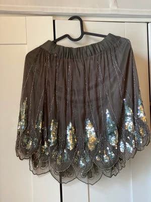 Beautiful skirt with sequins detailing  - Beautiful mini skirt with sequins details. Never worn 
