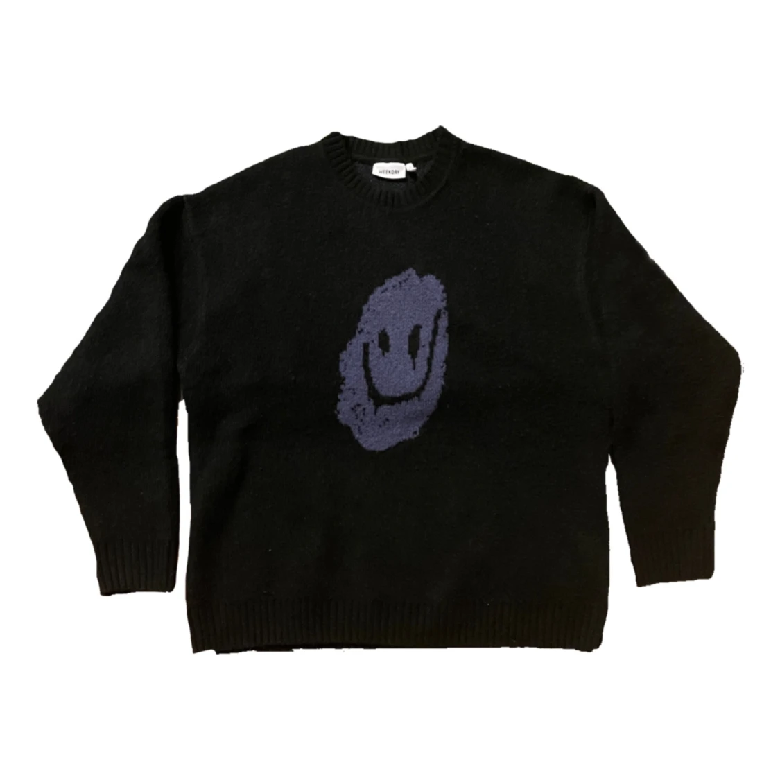 Stickad tröja med motiv