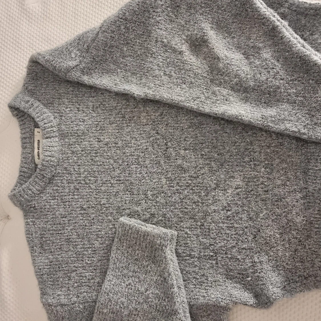 Stickad tröja CW blå