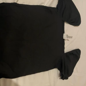 Svart topp - Svart topp  Storlek xs