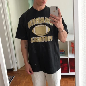 College T-shirt - Amerikans fotboll college t-shirt storlek XL (herr)