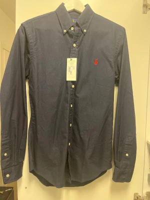 Ralph Lauren - Helt ny Ralph Lauren skjorta med prislapp på. Nypris 1 199:- 