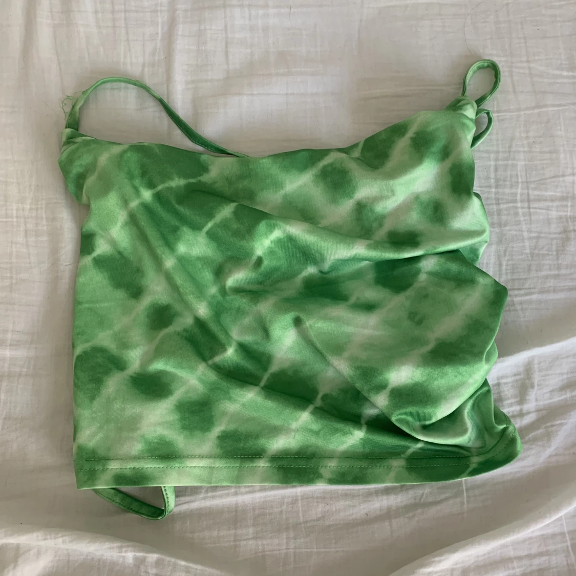 Linne med öppen rygg