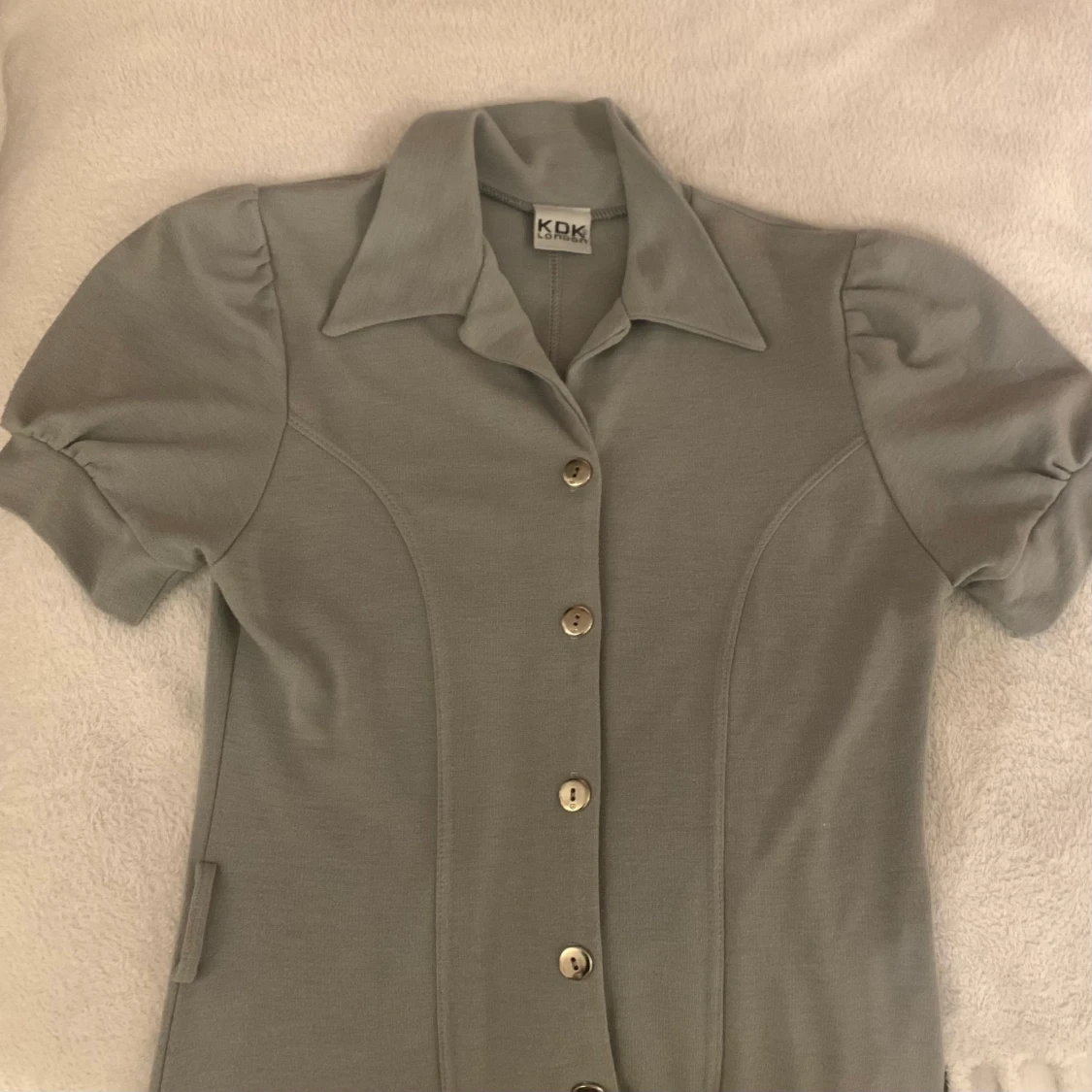 Grå trikåklänning st M  - 91