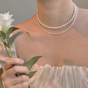 Pärlhalsband - Första bilden är lånad från pinterest. Sitter lite lägre än på pinterest bilden, guldet är ej riktigt och inte diamanterna på låset. Priset kan diskuteras!