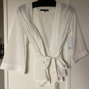 Blus - Blus från Happy Holly. Oanvänd. Storlek 32/34.