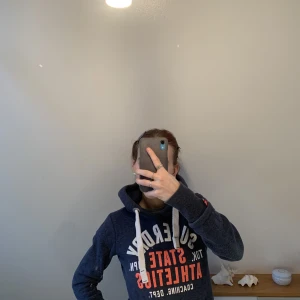 Comfy hoodie - En blå superdry hoodie i storlek xs