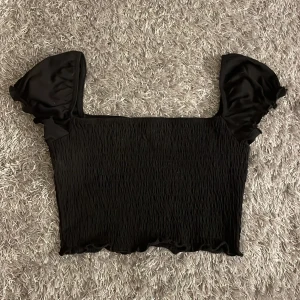 Topp - Svart topp, aldrig använd!