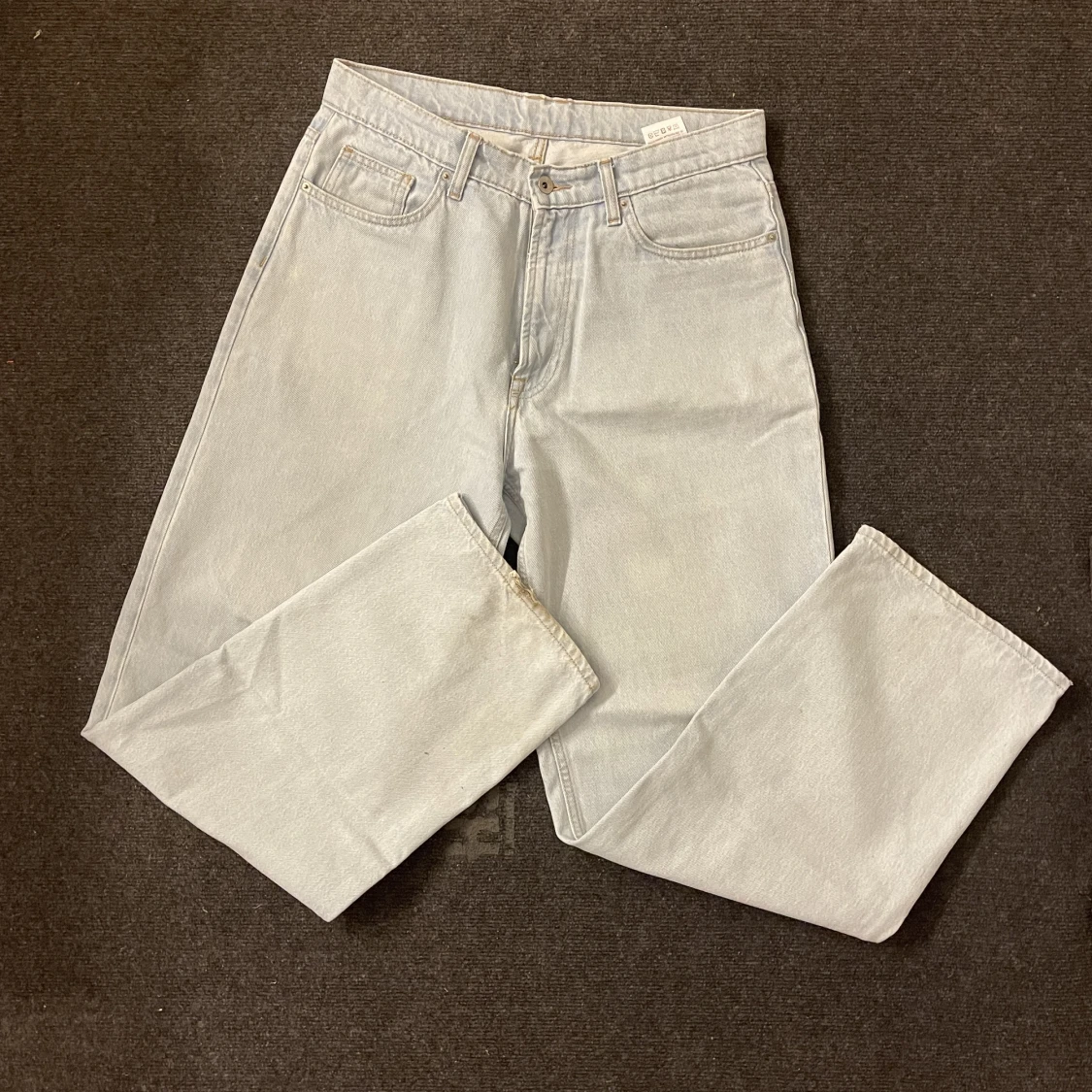 Ljusblåa baggy jeans