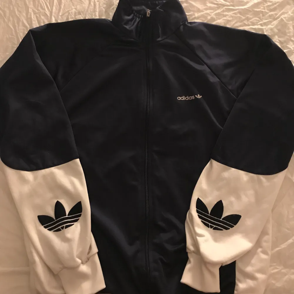 A full retro adidas tracksuit.  In great condition.  Size 192 which is large.  Happy to answer any quotations.. Hoodies.