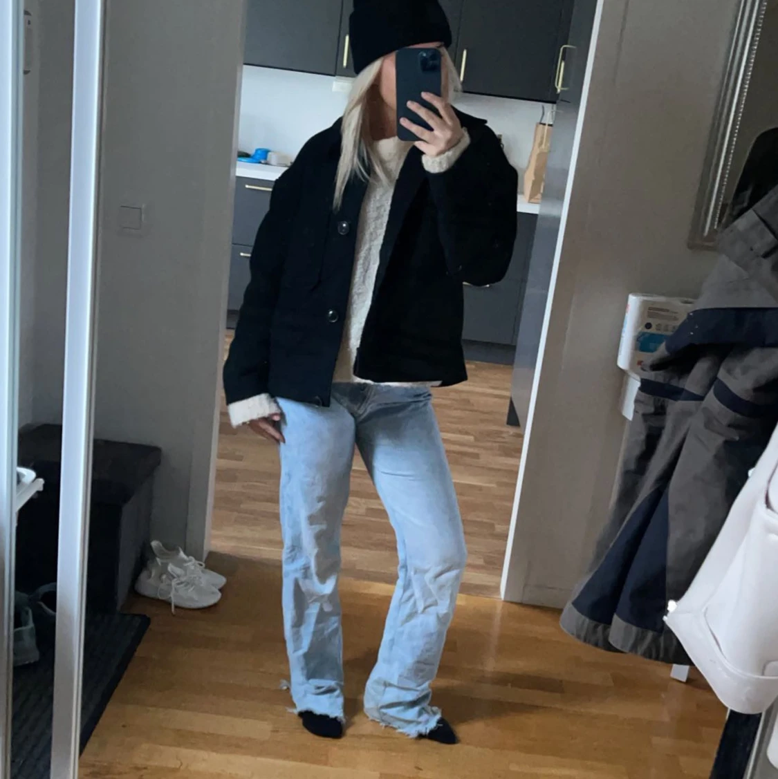 Svart kappa liknade arket 