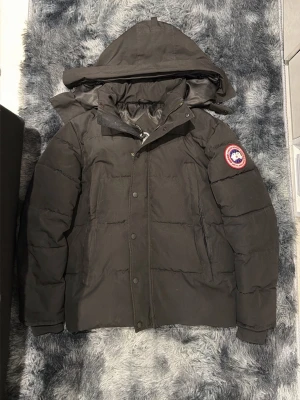 Canada Goose black jacket red logo - Size M. Used a bit still new