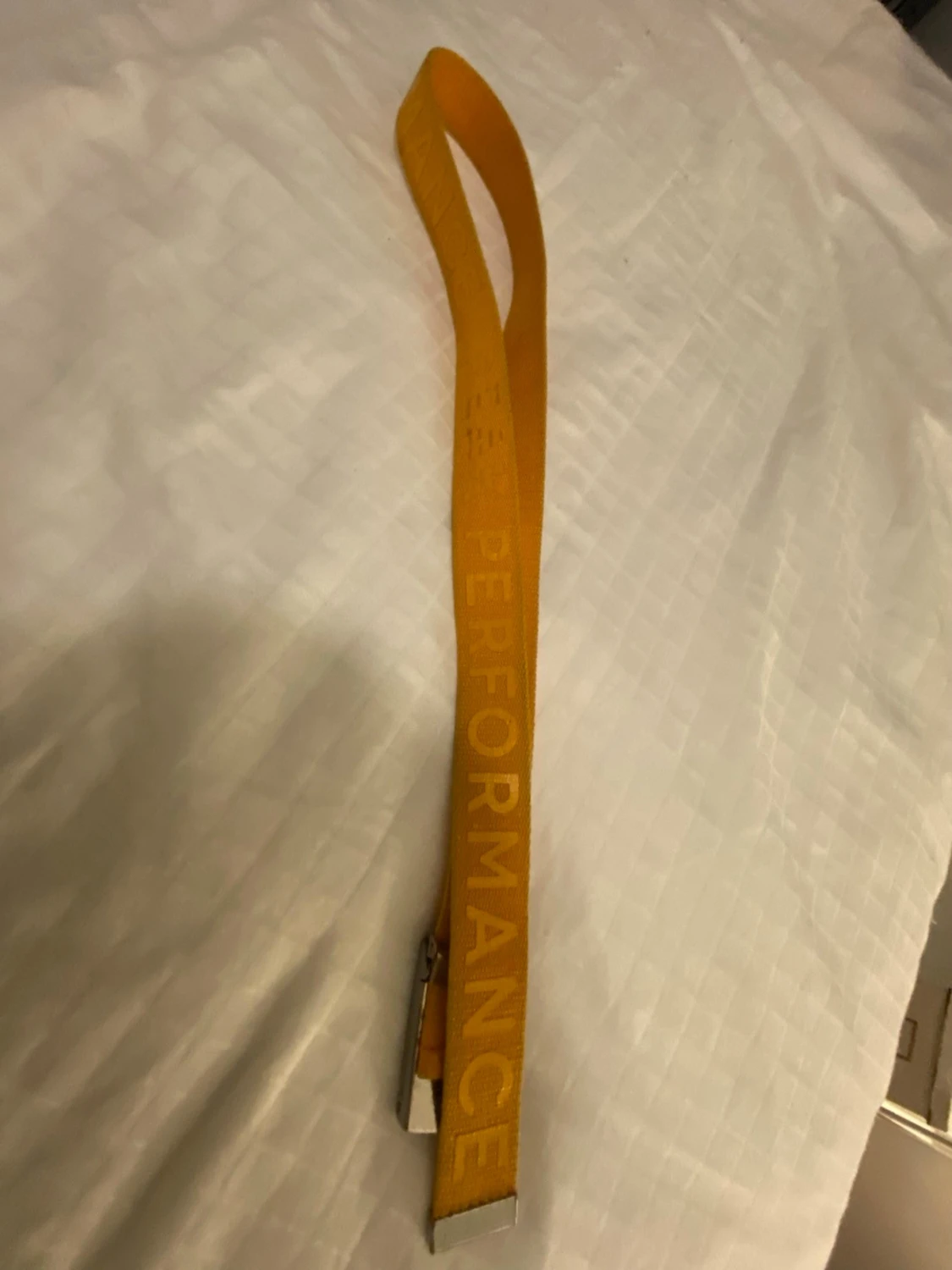 Gul tygbälte från Peak Performance