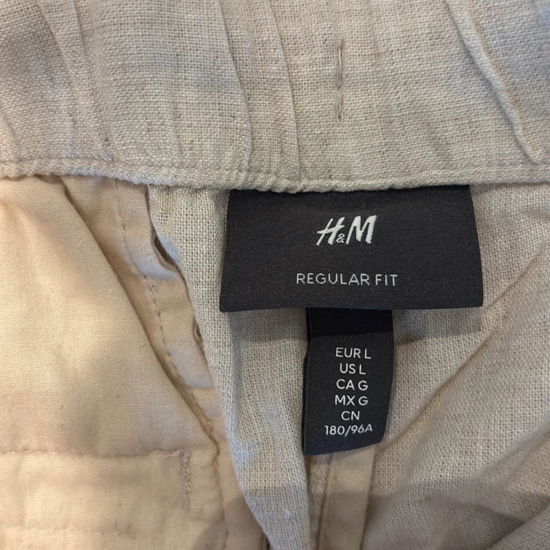 Beiga linnebyxor från H&M med snörning - 1