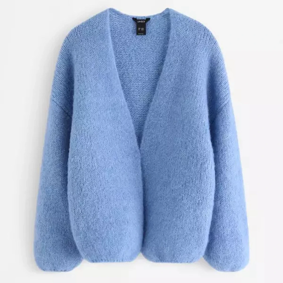 Blå stickad kofta från Lindex