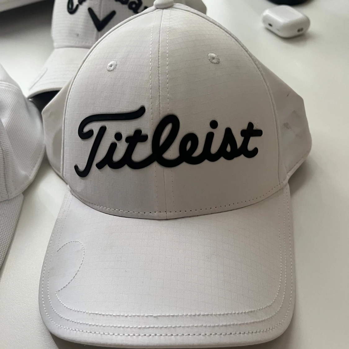 Tre golfkepsar ett pris - 2