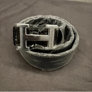 Svart H bälte  - Har ej använt den mycket 