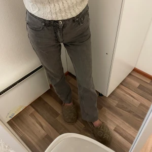 Ginatricot full length flare jeans - In great condition grey Gina Tricot jeans in size 34/XS. The jeans have been shortened.  Measurements: • Length from waist to hem: 99 cm • Waist width: 33 cm  I’m 168 cm tall, and these fit nicely on someone shorter as well, or up to around 170 cm.  Model number: 16968-2022 (sold-out style). Original price: €49.99 Material: 99% cotton, 1% elastane. More pics: https://www.vinted.fi/items/7138323403-ginatricot-full-length-flare-jeans