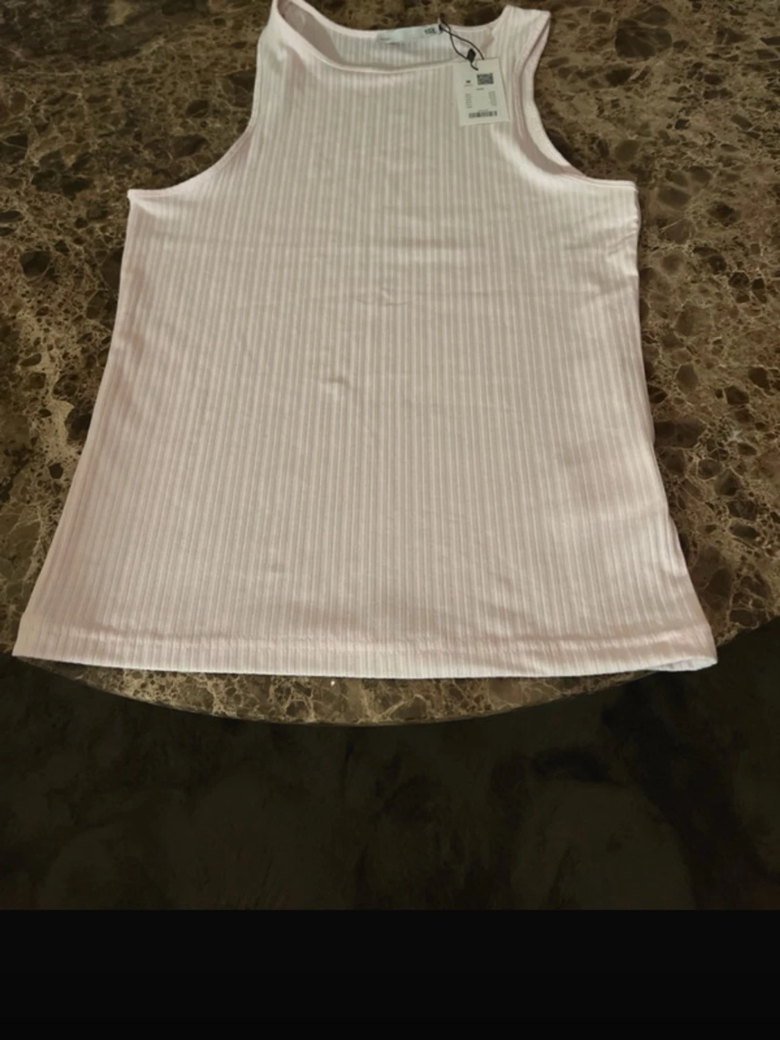 Ljusrosa ribbad linnetopp