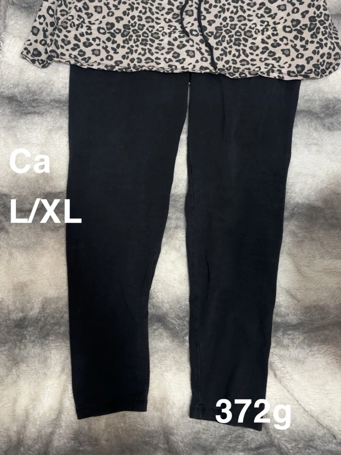 Svarta leggings med kjol i storlek L/XL