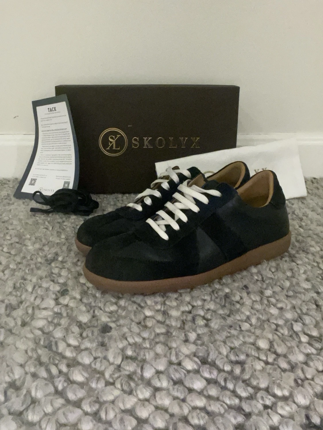 Blåa skolyx gast i mocka 