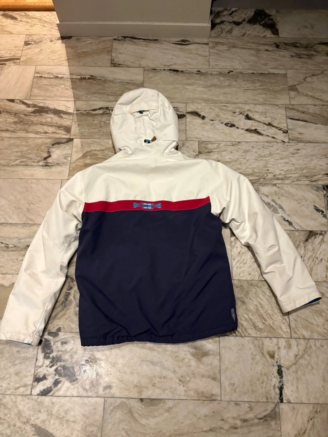 Vit och mörkblå slalomjacka med huva från Peak performance  - 1