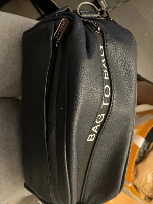 Shoulder bag  - Blue almost black bag medium to small size unused and new 