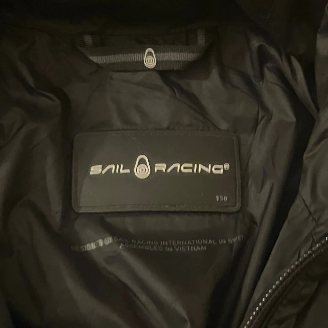 Svart pufferjacka från Sail Racing - 2