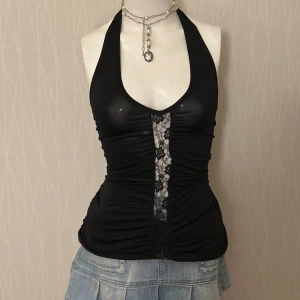 Rushed halter neck top  - Slightly long, but made of very lightweight fabric that can be easily folded or adjusted to the desired length