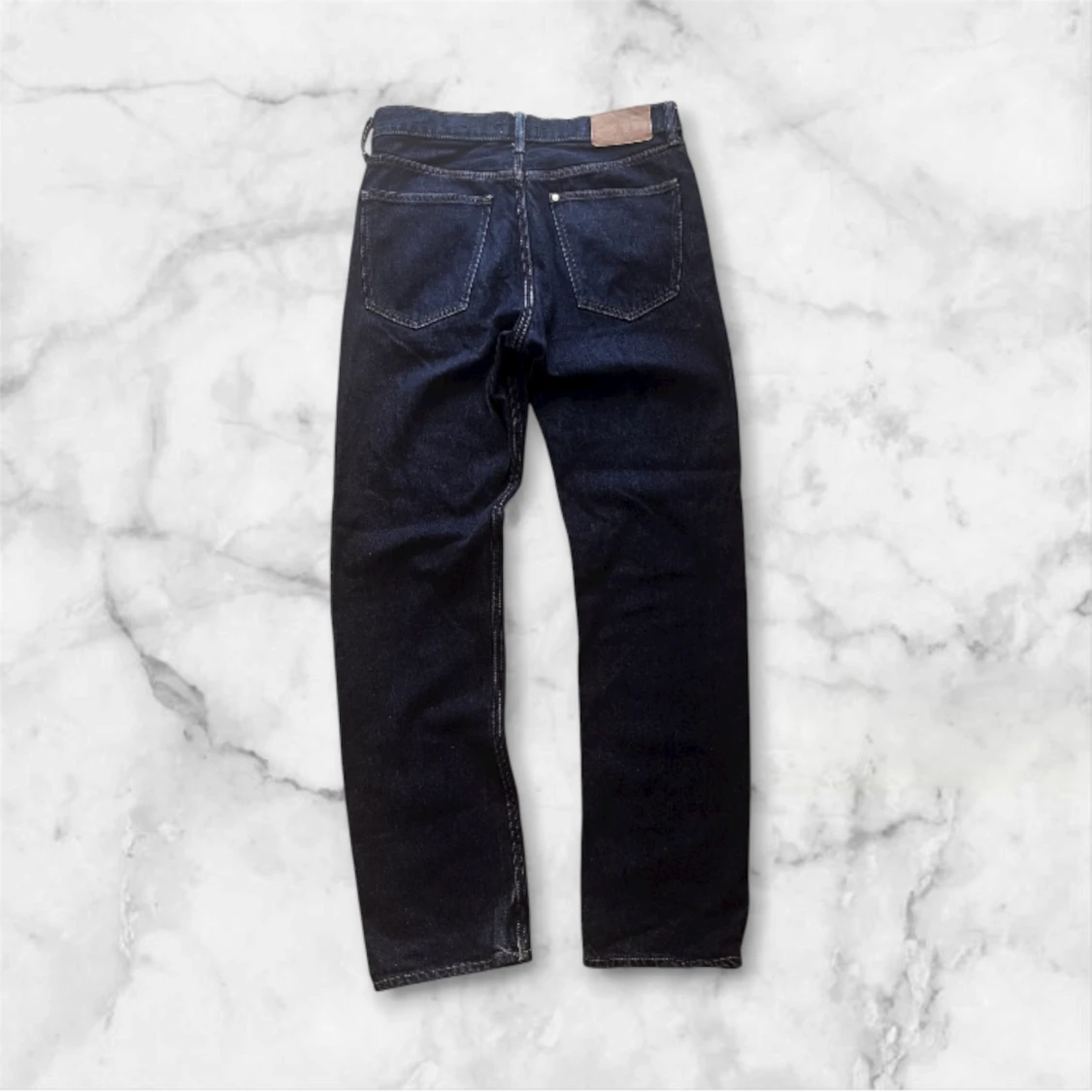 Mörkblå jeansbyxor från H&M 30/32 - 1