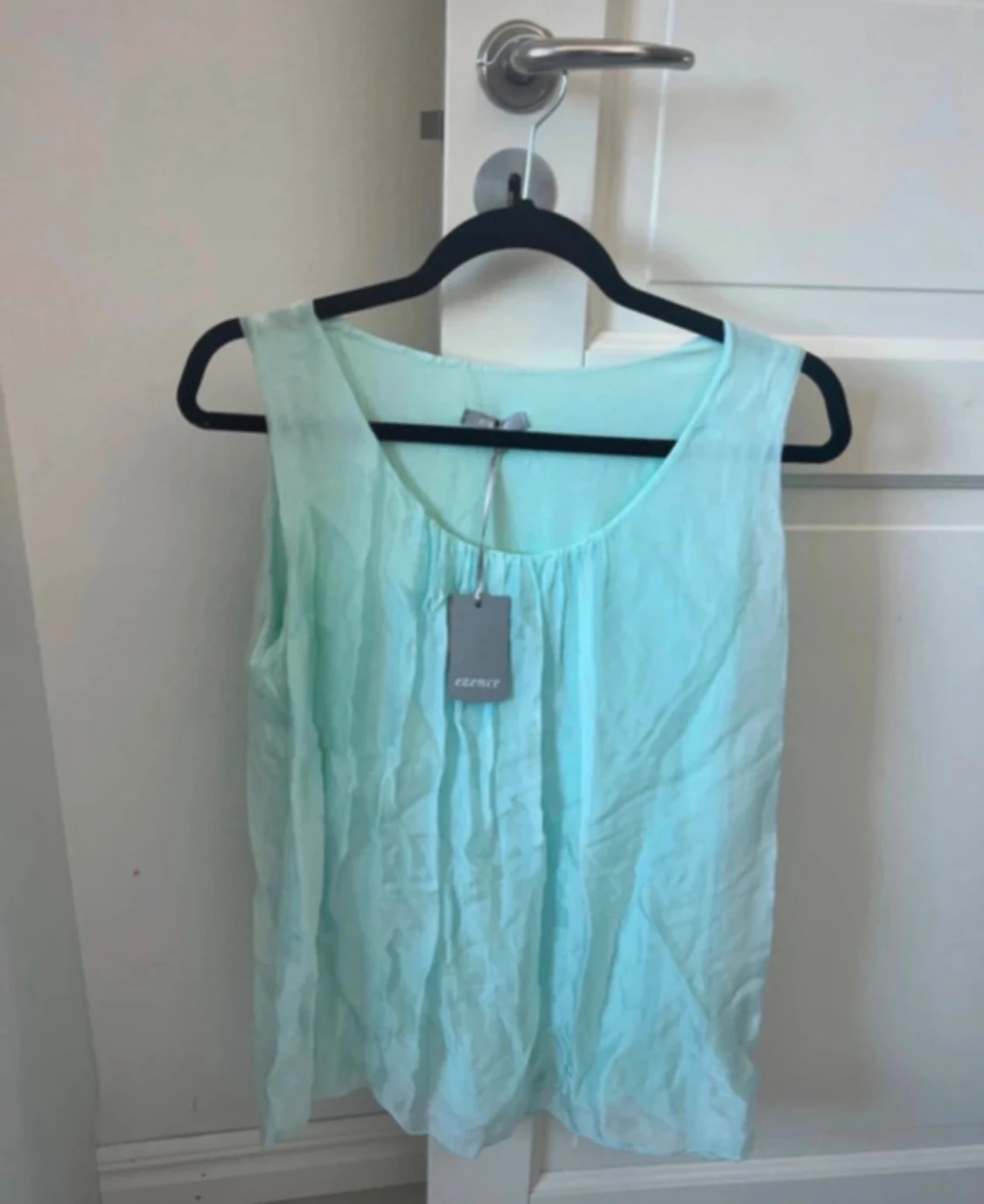 Mintgrön linnetopp i sidenmix 