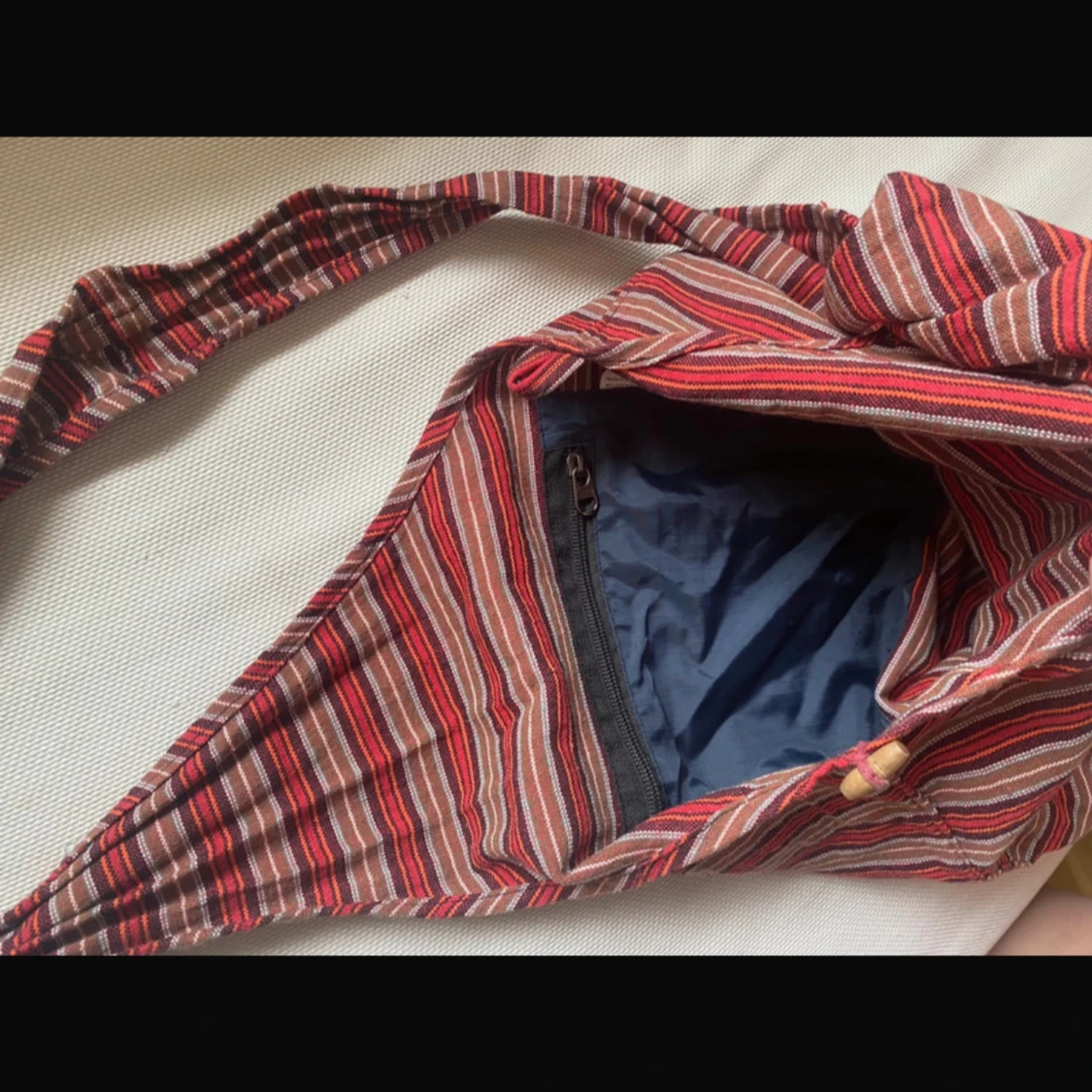 Randig axelväska i bomull - 1