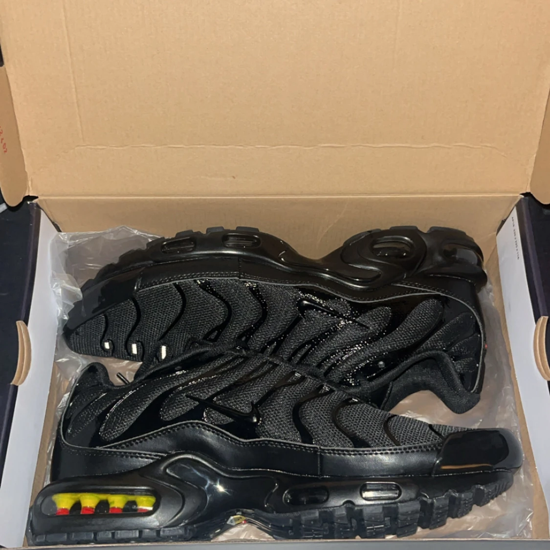 Svarta Nike Air Max Plus sneakers