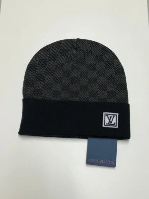 Lv Mössa - Helt ny aldrig använd. Storlek One size. Snabb frakt fraktar inom 24h.