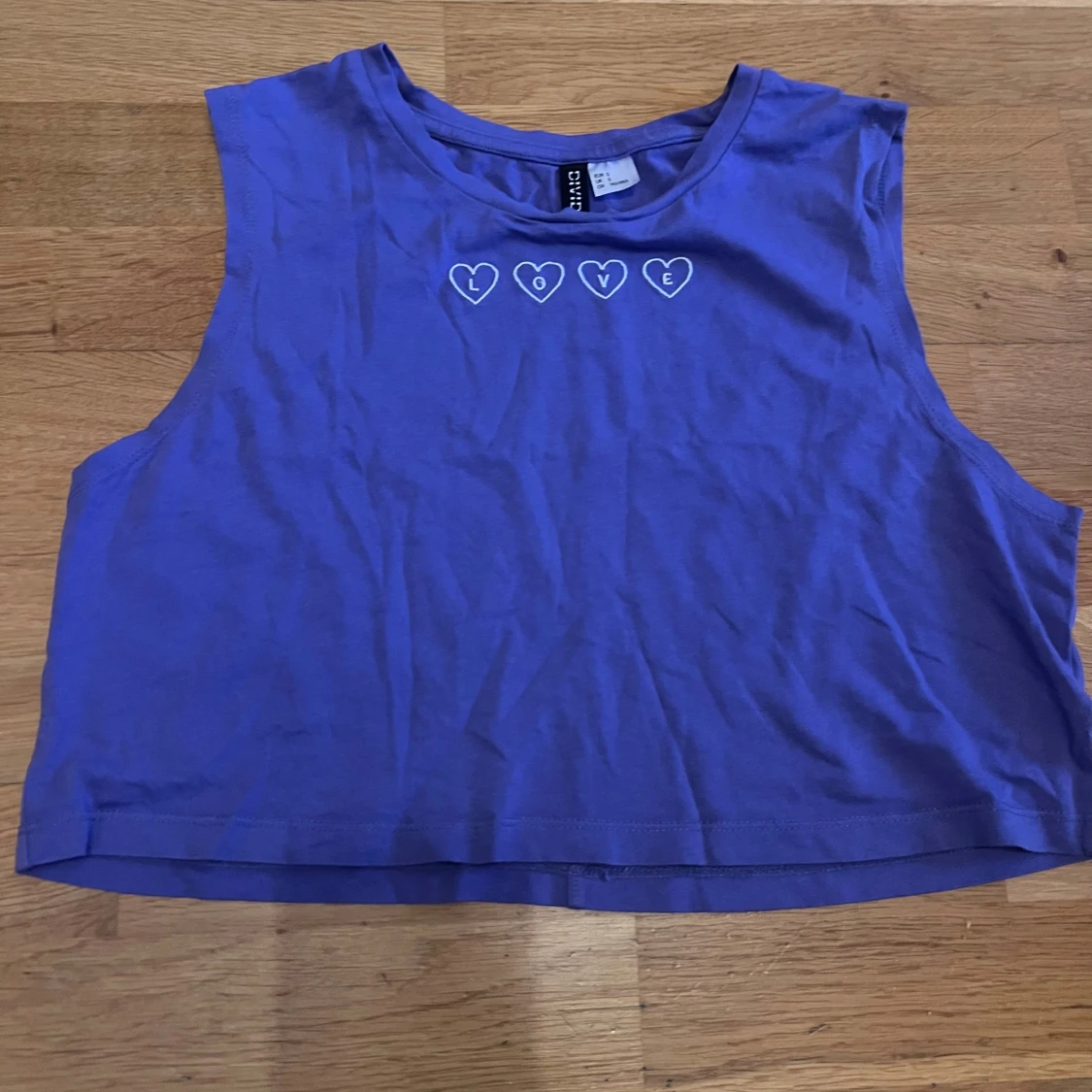 Lila croppad linnetopp från Divided H&M